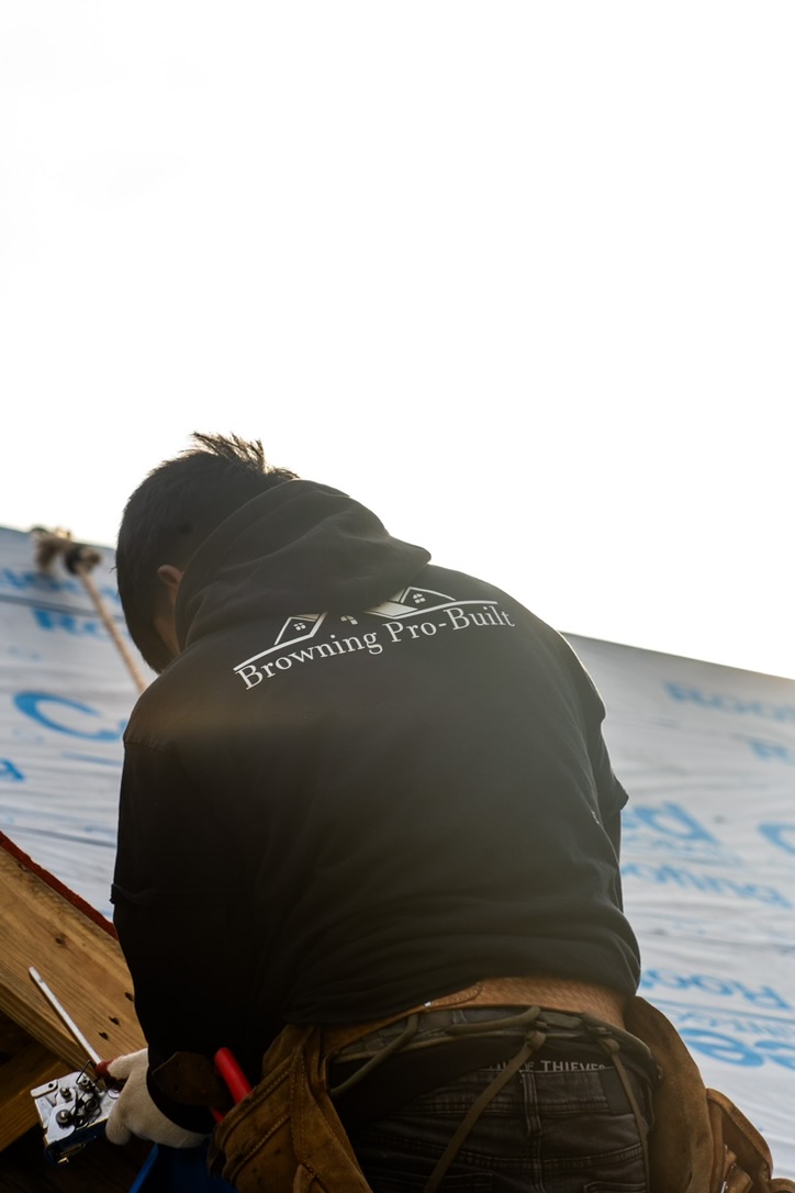 Browning Pro-Built crew member installing CertainTeed roofing underlayment
