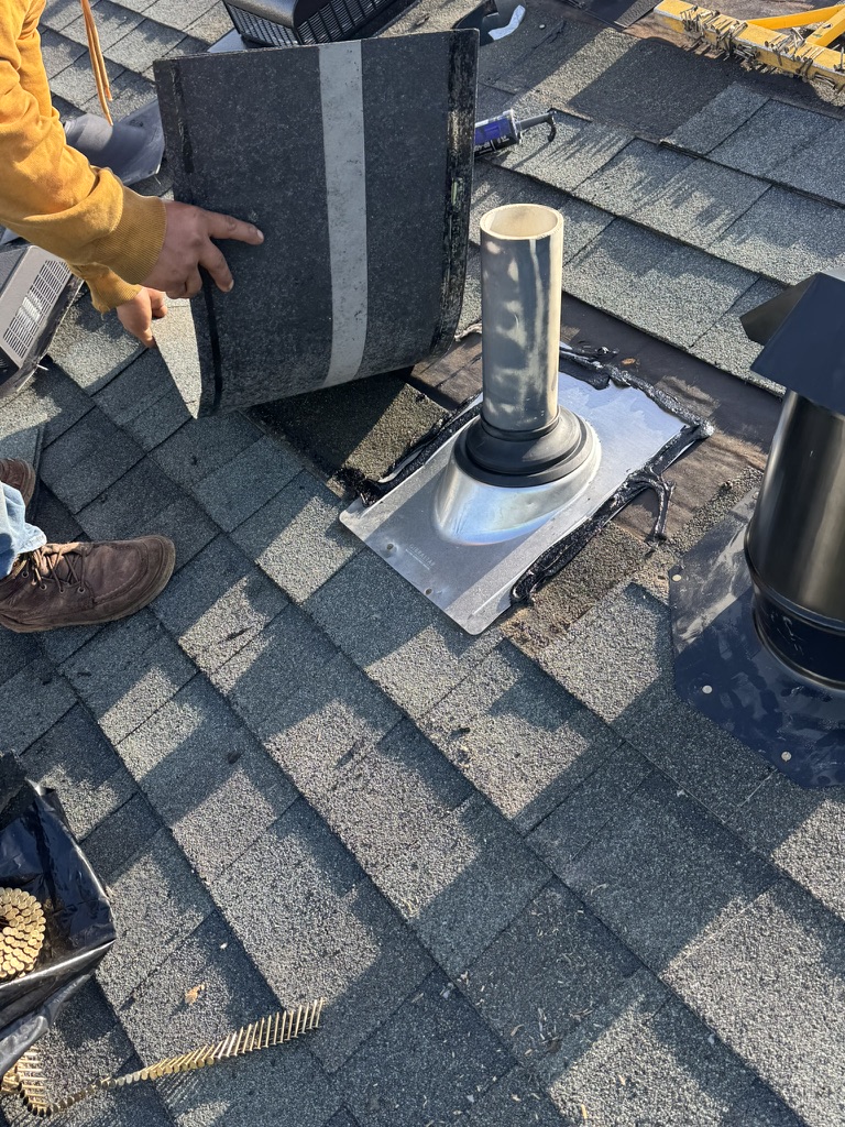 Roof repair on Bowie townhome